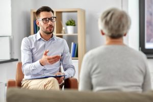 Therapist guiding a person through individual addiction counseling