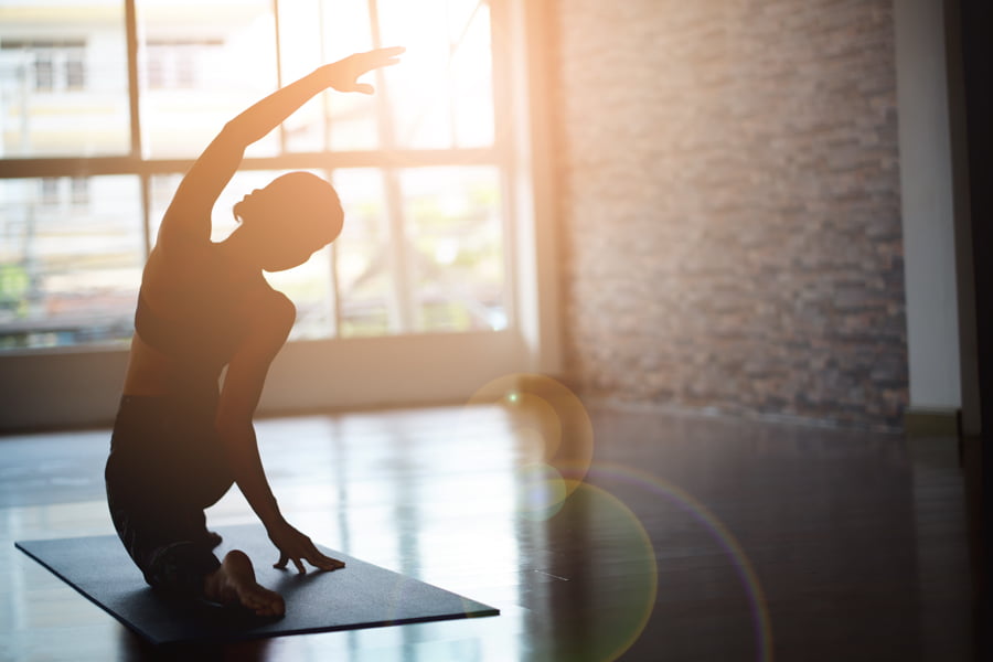 a woman doing yoga
