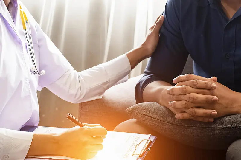 counselor explaining addiction recovery steps