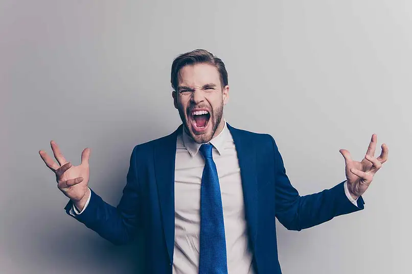 Man in suit battling his OCD