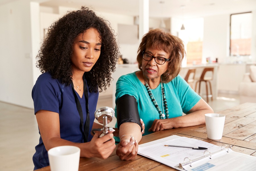 Doctor Observing Patient for Seizures Related to Alcohol Use
