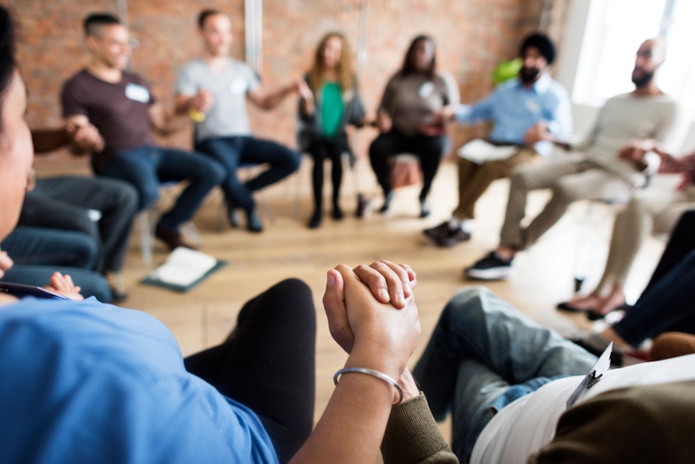 People in a Group Therapy Session Discussing the Effects of Drugs on Personality