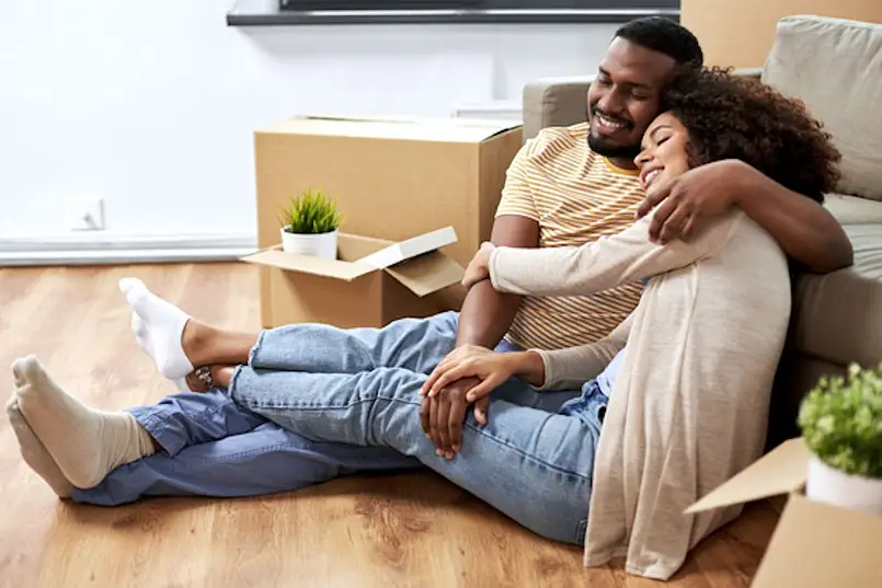 a couple sitting and hugging while being sober