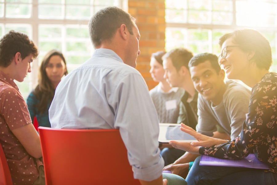 Group therapy session discussing how alcohol can cause drowsiness and affect sleep patterns