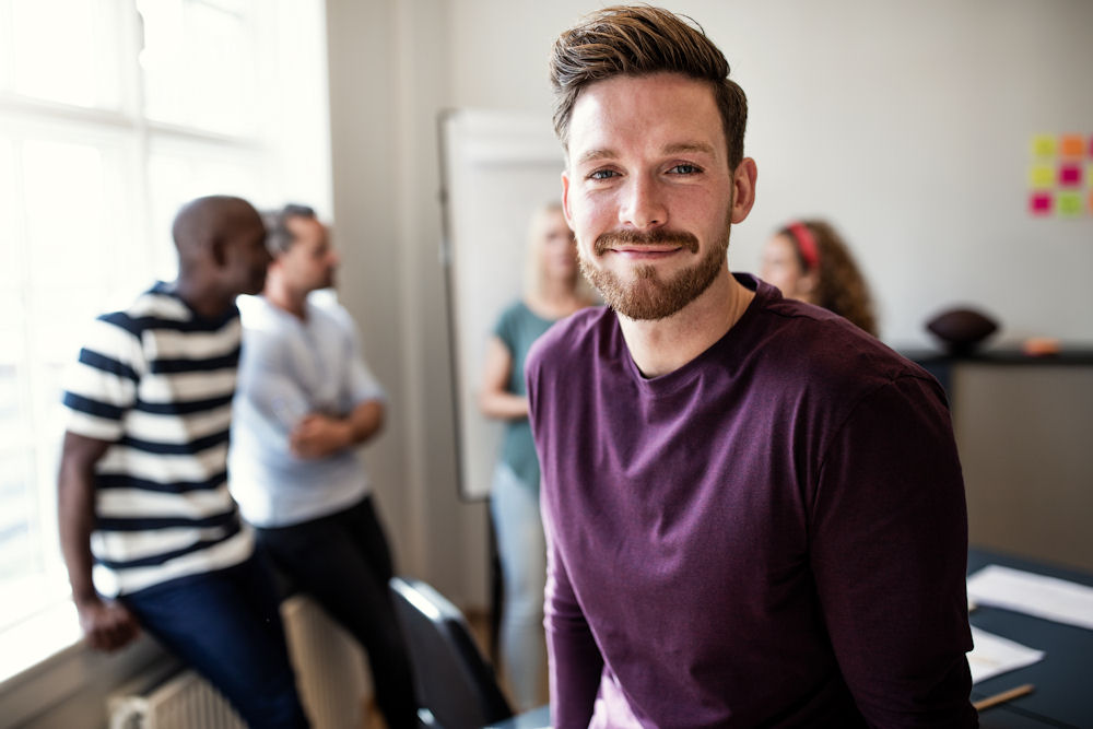 happy man in addiction treatment