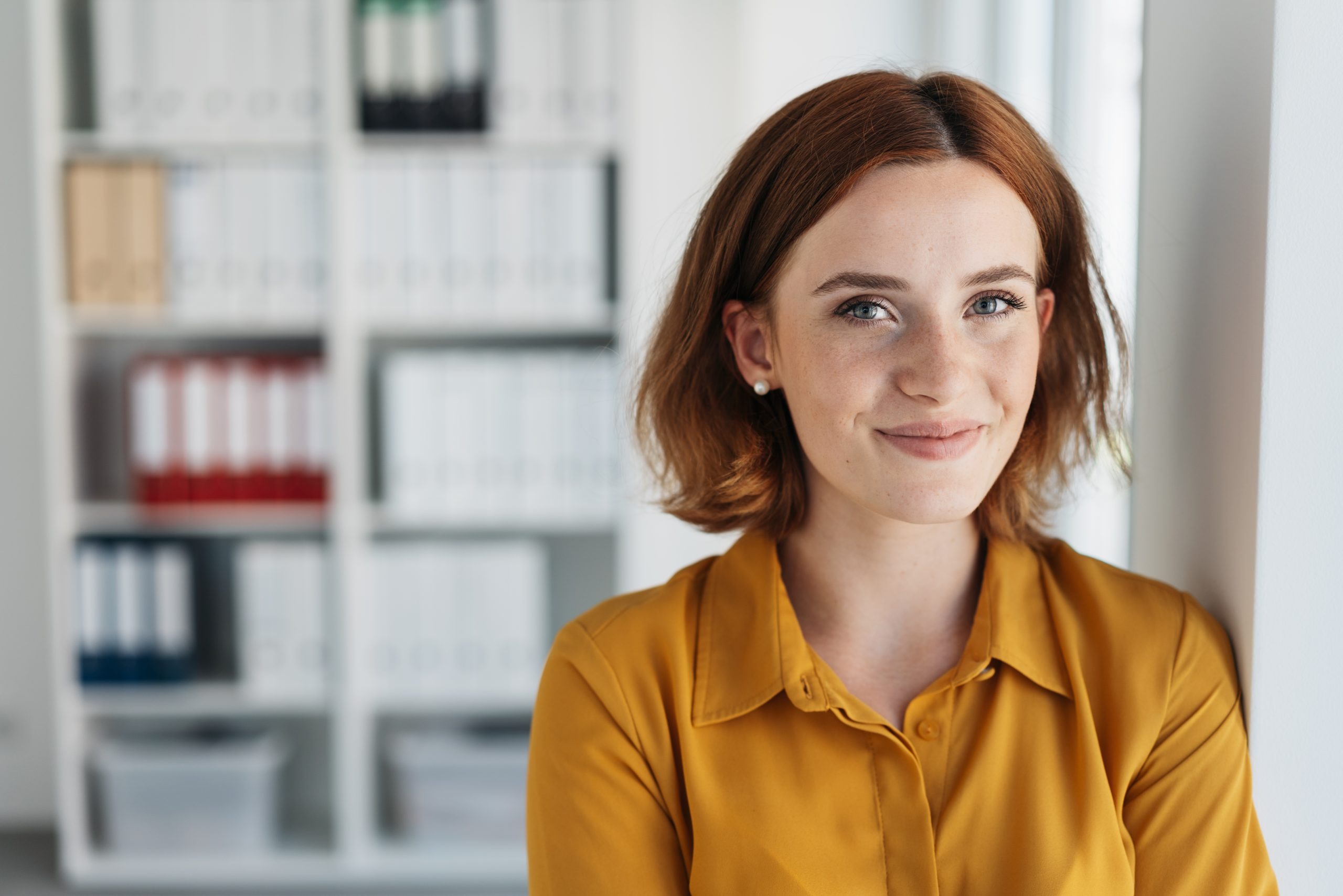 woman inside smiling in recovery
