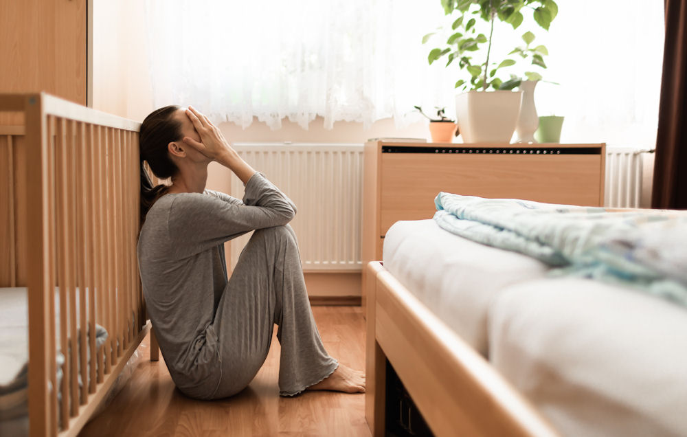 a-woman-with-postpartum-depression-in-therapy