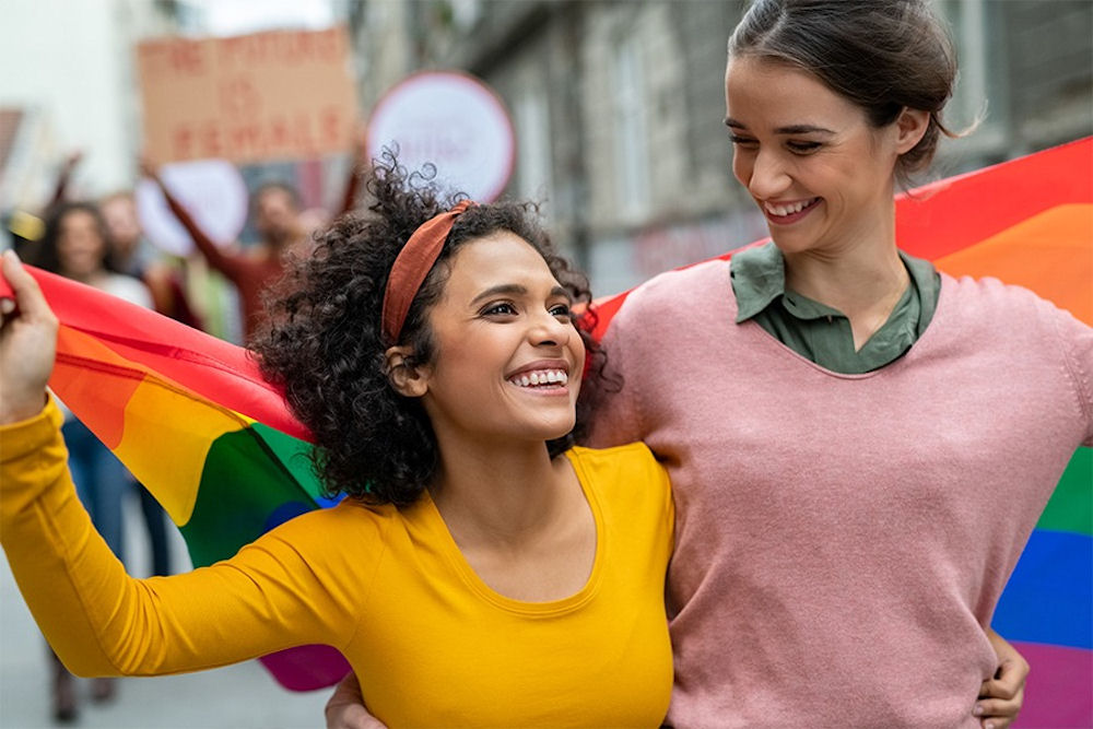 two women celebrating pride month
