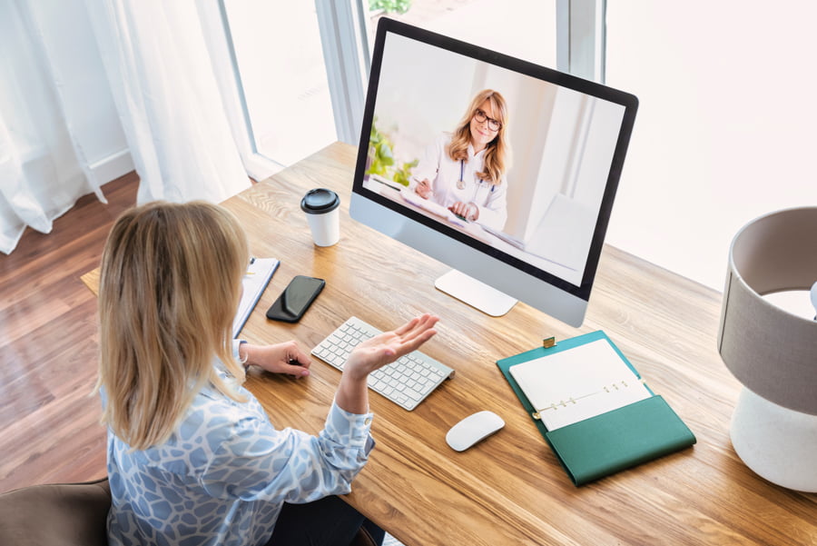 woman consulting about her Aetna Insurance Coverage