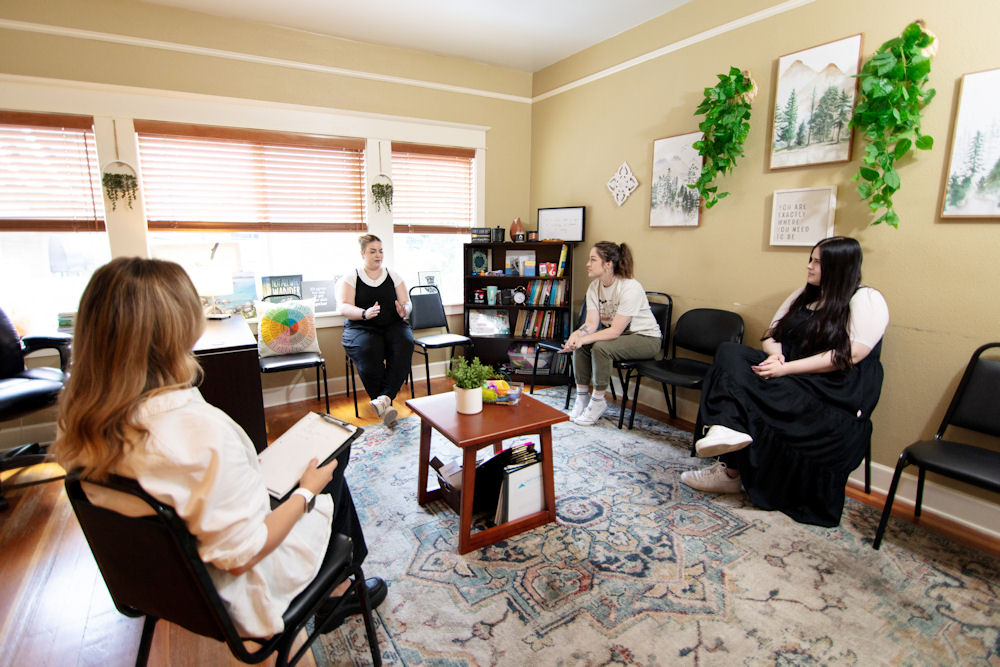 Group therapy at aftercare programs.