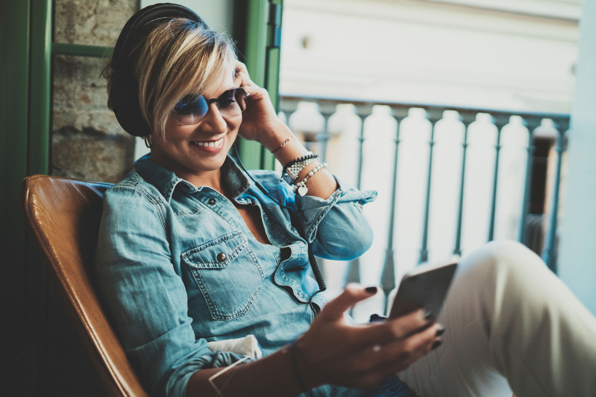 Woman checking her finances on her phone to pay for rehab