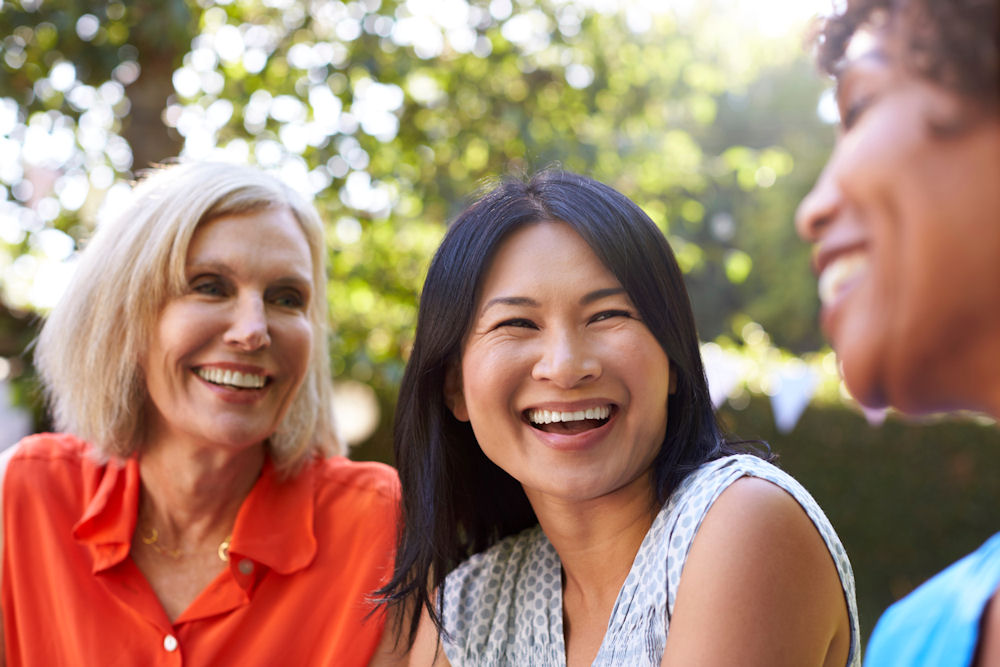 a-group-of-women-smiling