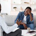 a-man-with-his-hand-on-his-head