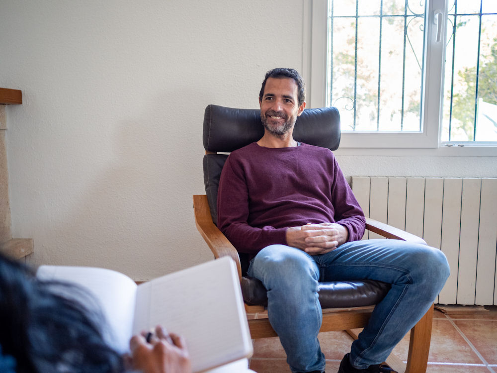 a-man-smiling-in-therapy
