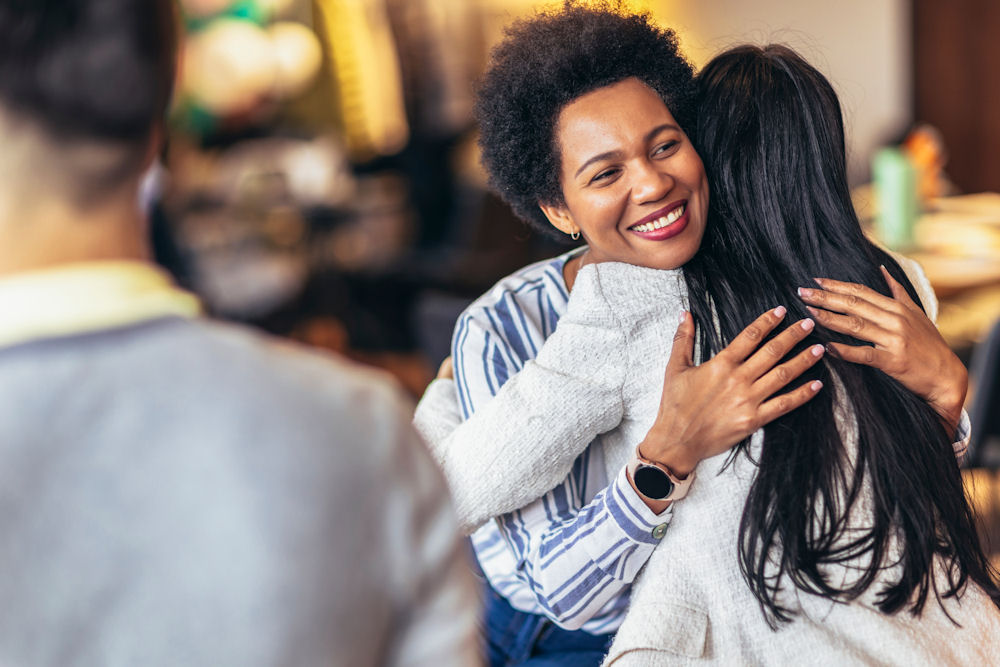 a-woman-hugging-therapist-in-therapy